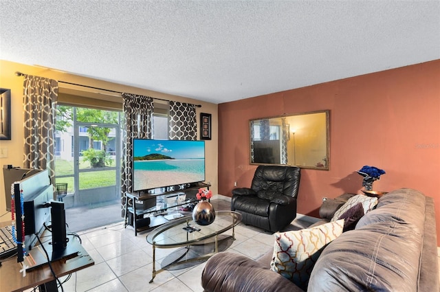 living room featuring a textured ceiling and light tile patterned floors