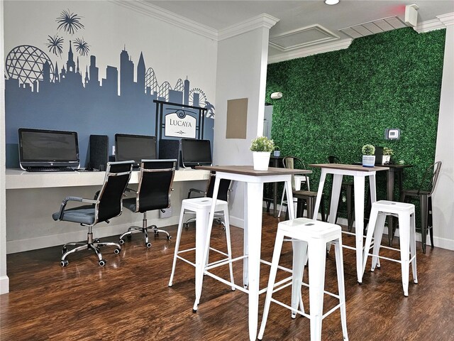 home office with hardwood / wood-style flooring and ornamental molding