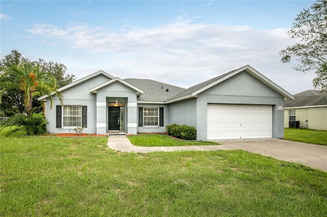 ranch-style home featuring a front lawn and a garage