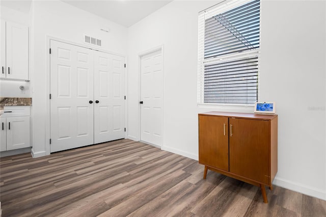 interior space with hardwood / wood-style floors