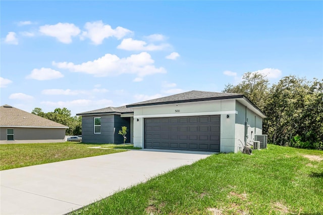 single story home with a garage and a front yard