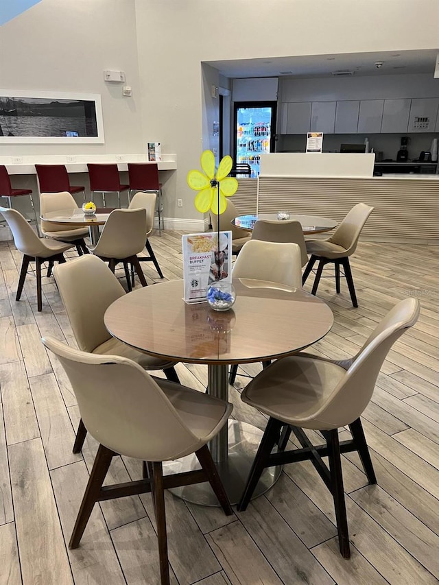 dining room with light wood-type flooring