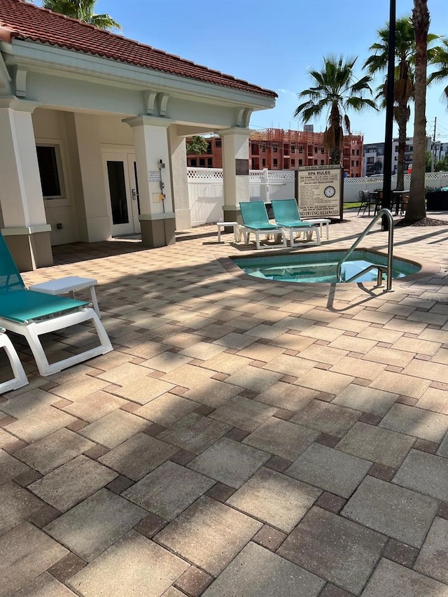 view of pool featuring a patio area