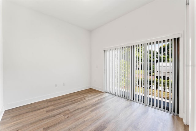 unfurnished room featuring light hardwood / wood-style floors