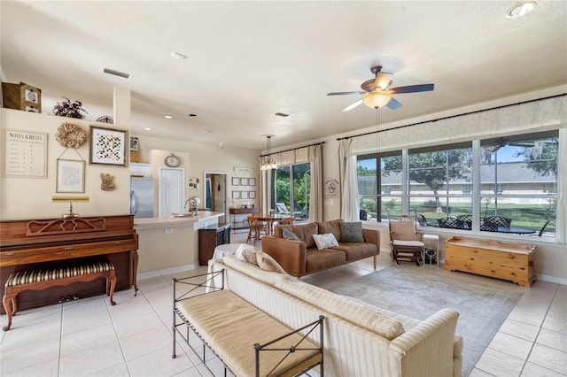 404 Hightower Dr, Debary, FL 32713 - living room featuring light tile patterned floors, ceiling fan, baseboards, and recessed lighting