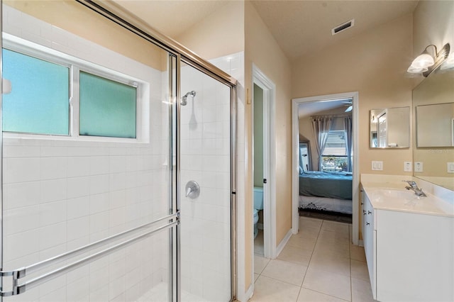 404 Hightower Dr, Debary, FL 32713 - full bath featuring toilet, vanity, a stall shower, tile patterned flooring, and lofted ceiling