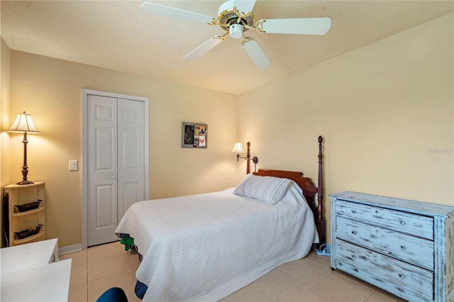 404 Hightower Dr, Debary, FL 32713 - bedroom featuring a closet, light tile patterned floors, a ceiling fan, and baseboards