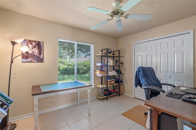 404 Hightower Dr, Debary, FL 32713 - office area with a ceiling fan, a textured ceiling, light tile patterned floors, and baseboards