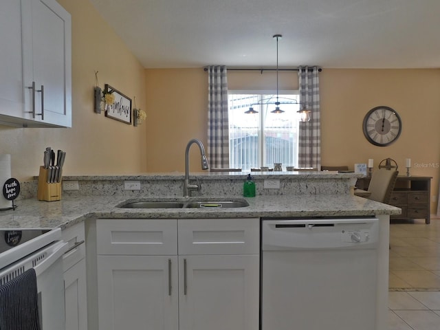 kitchen featuring sink, light tile patterned floors, white appliances, light stone countertops, and white cabinets