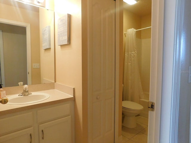 full bathroom featuring shower / tub combo with curtain, vanity, toilet, and tile patterned flooring