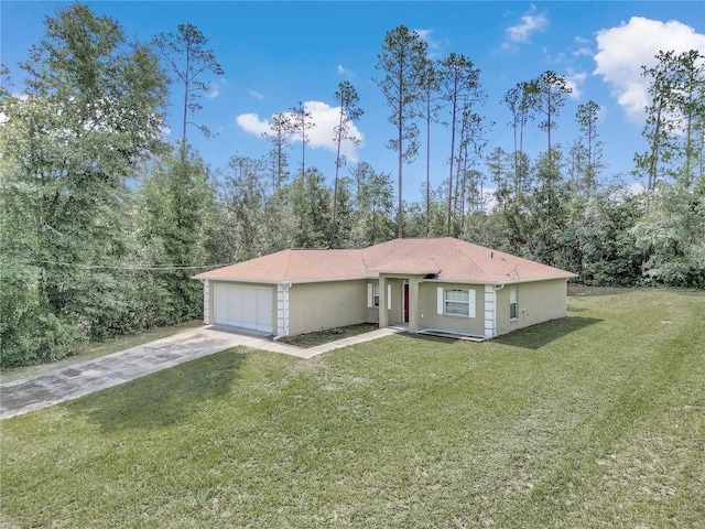 view of front of house with a garage and a front lawn