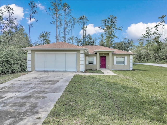 single story home featuring a garage and a front yard