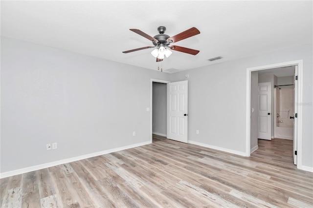 unfurnished bedroom featuring ceiling fan and light hardwood / wood-style floors