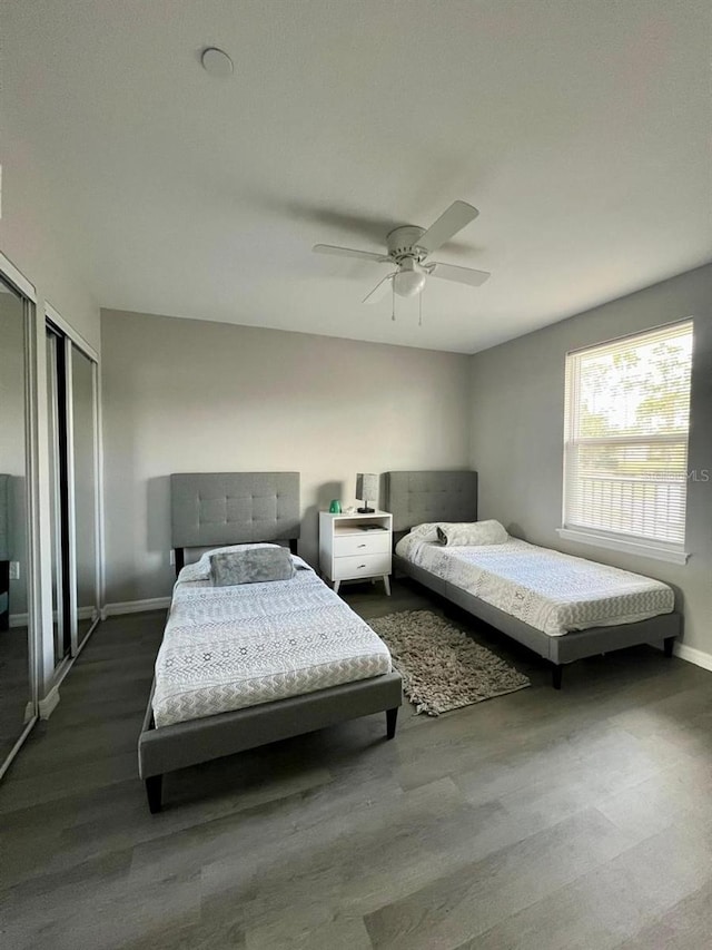 bedroom featuring ceiling fan and hardwood / wood-style flooring