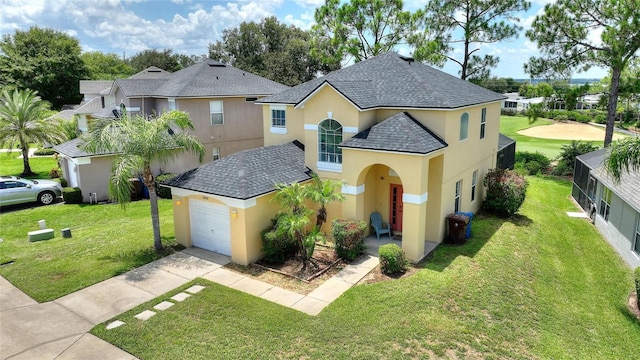 view of front of property with a garage and a front yard