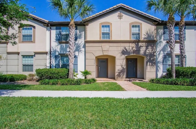 view of front of house featuring a front lawn