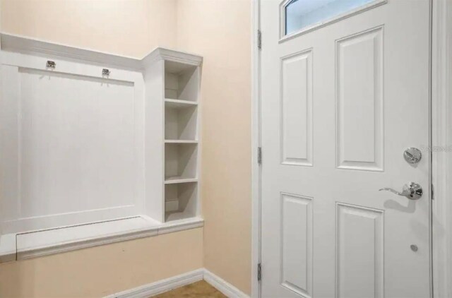 mudroom featuring baseboards