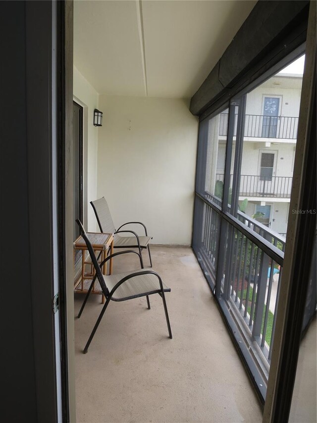 balcony featuring a sunroom