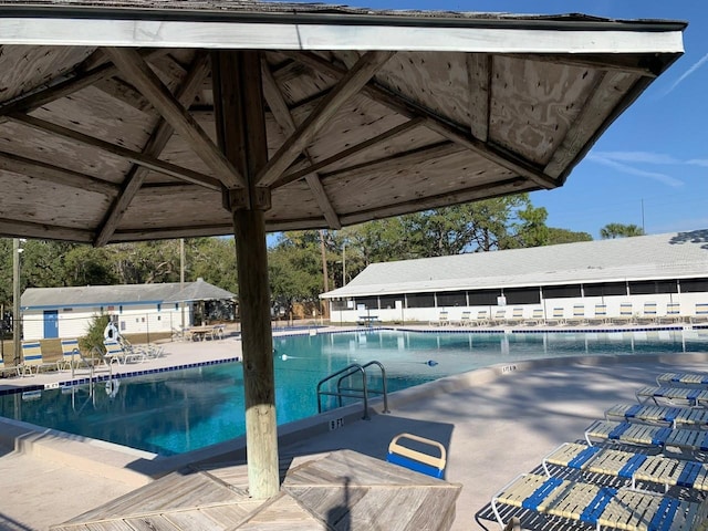 view of pool with a patio area