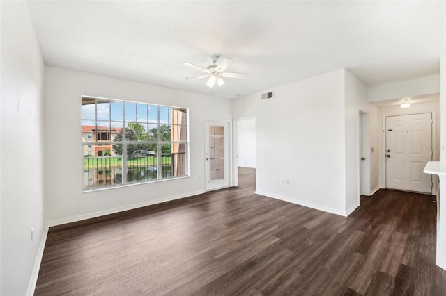 interior space featuring dark hardwood / wood-style flooring and ceiling fan