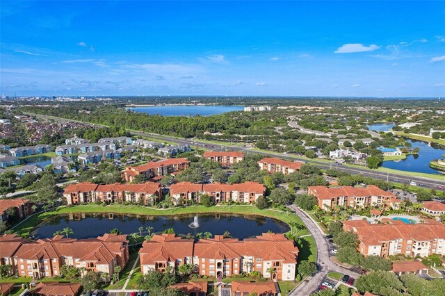 drone / aerial view with a water view