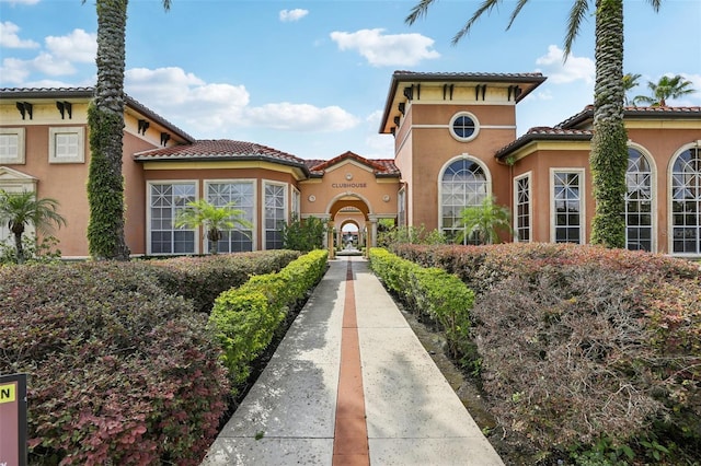 5530 Metrowest Blvd Unit 9-211, Orlando, FL 32811 - view of front of home with stucco siding and a tile roof