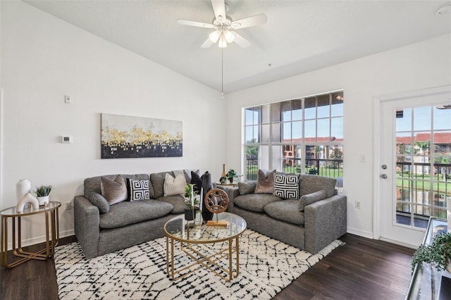 5530 Metrowest Blvd Unit 9-211, Orlando, FL 32811 - living area with wood finished floors, baseboards, ceiling fan, and lofted ceiling
