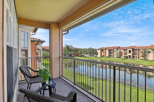5530 Metrowest Blvd Unit 9-211, Orlando, FL 32811 - balcony with a water view and a residential view
