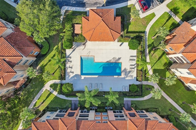 5530 Metrowest Blvd Unit 9-211, Orlando, FL 32811 - aerial view of property and surrounding area featuring a pool area