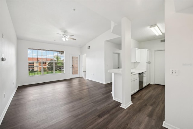 kitchen featuring stainless steel dishwasher, dark wood-type flooring, white cabinetry, and ceiling fan