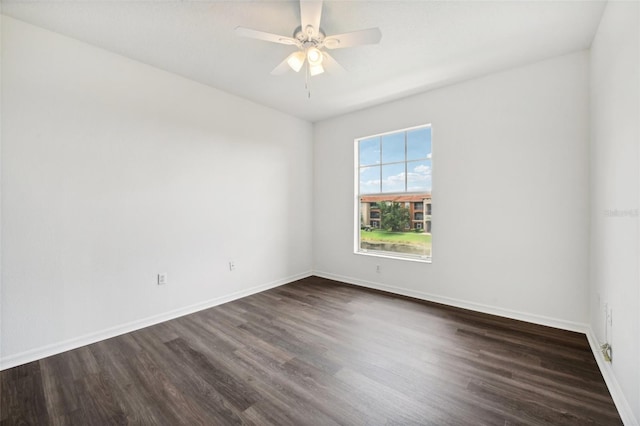 empty room with hardwood / wood-style flooring and ceiling fan