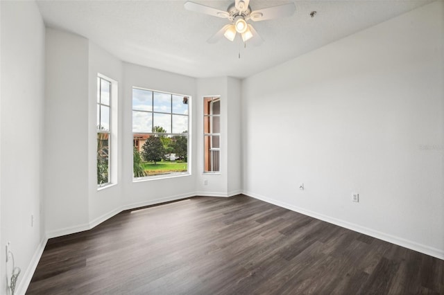 unfurnished room with ceiling fan and hardwood / wood-style flooring