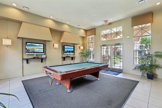 game room with light tile patterned floors and pool table