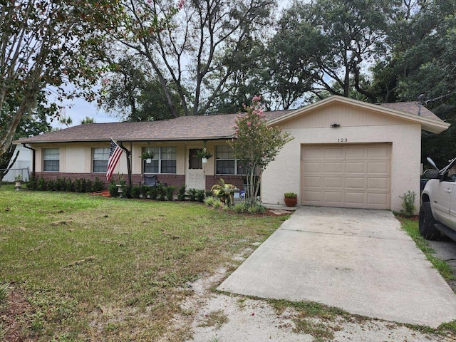 single story home featuring a front lawn, a garage, and covered porch