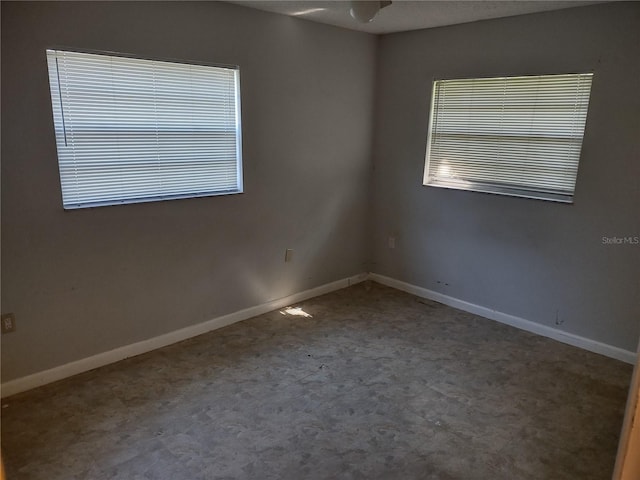 unfurnished room featuring carpet flooring