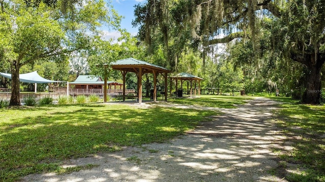 view of community featuring a gazebo and a lawn