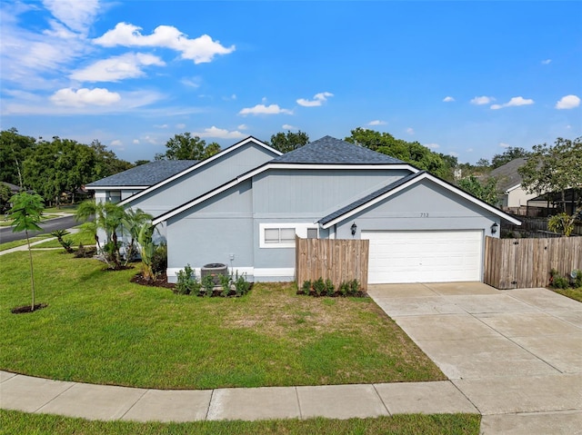 view of property exterior featuring a garage and a lawn