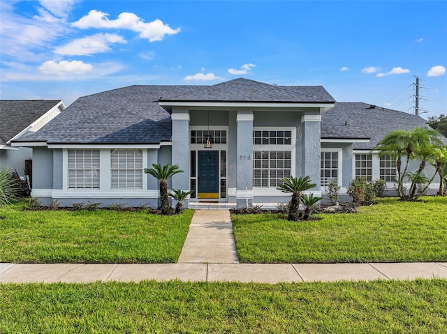 view of front of house with a front yard