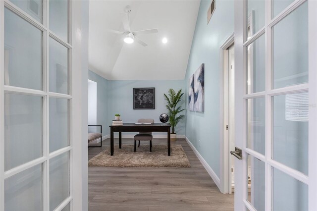 office area featuring ceiling fan, high vaulted ceiling, light hardwood / wood-style floors, and french doors