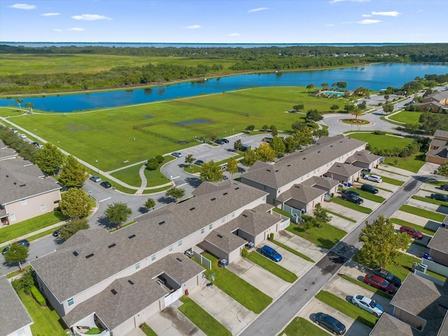 bird's eye view with a water view