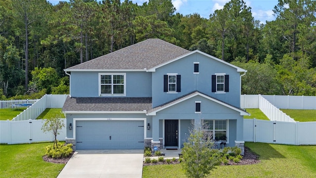 view of front facade featuring a garage and a front lawn