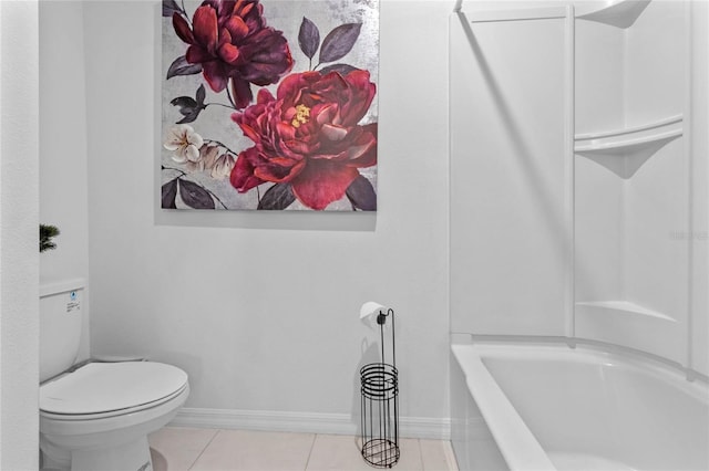 bathroom with tile patterned floors and toilet