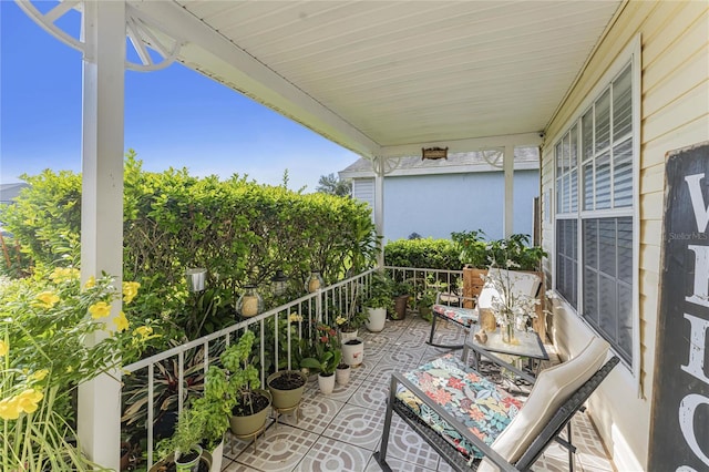 balcony featuring a sunroom