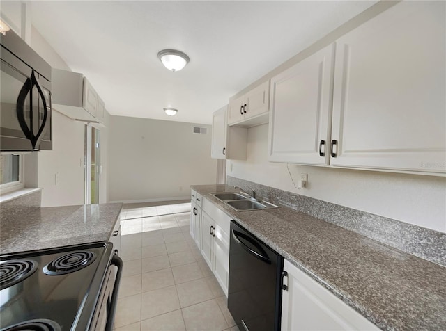 kitchen with white cabinetry, sink, light tile patterned floors, and black appliances