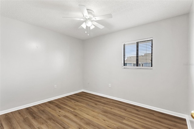 unfurnished room with a textured ceiling, hardwood / wood-style floors, and ceiling fan