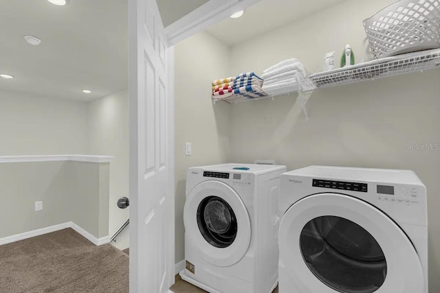 laundry area featuring separate washer and dryer and carpet floors