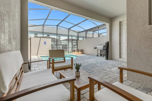 sunroom / solarium featuring lofted ceiling and plenty of natural light