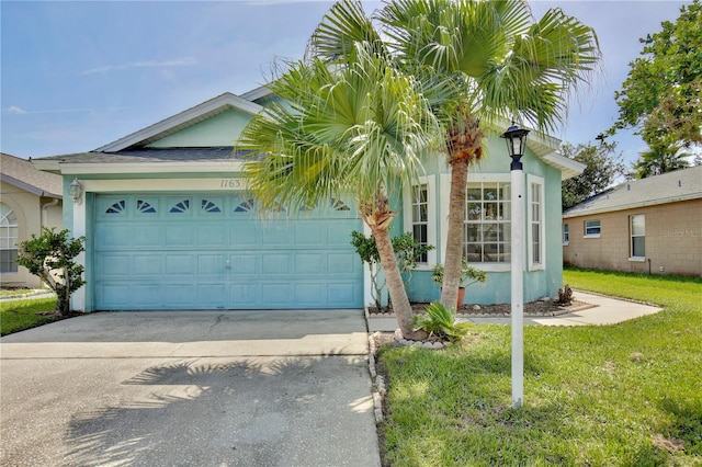 single story home with a garage and a front yard