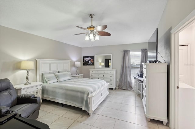 bedroom featuring ceiling fan and light tile patterned flooring