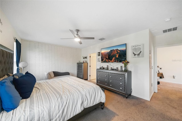 carpeted bedroom with ceiling fan